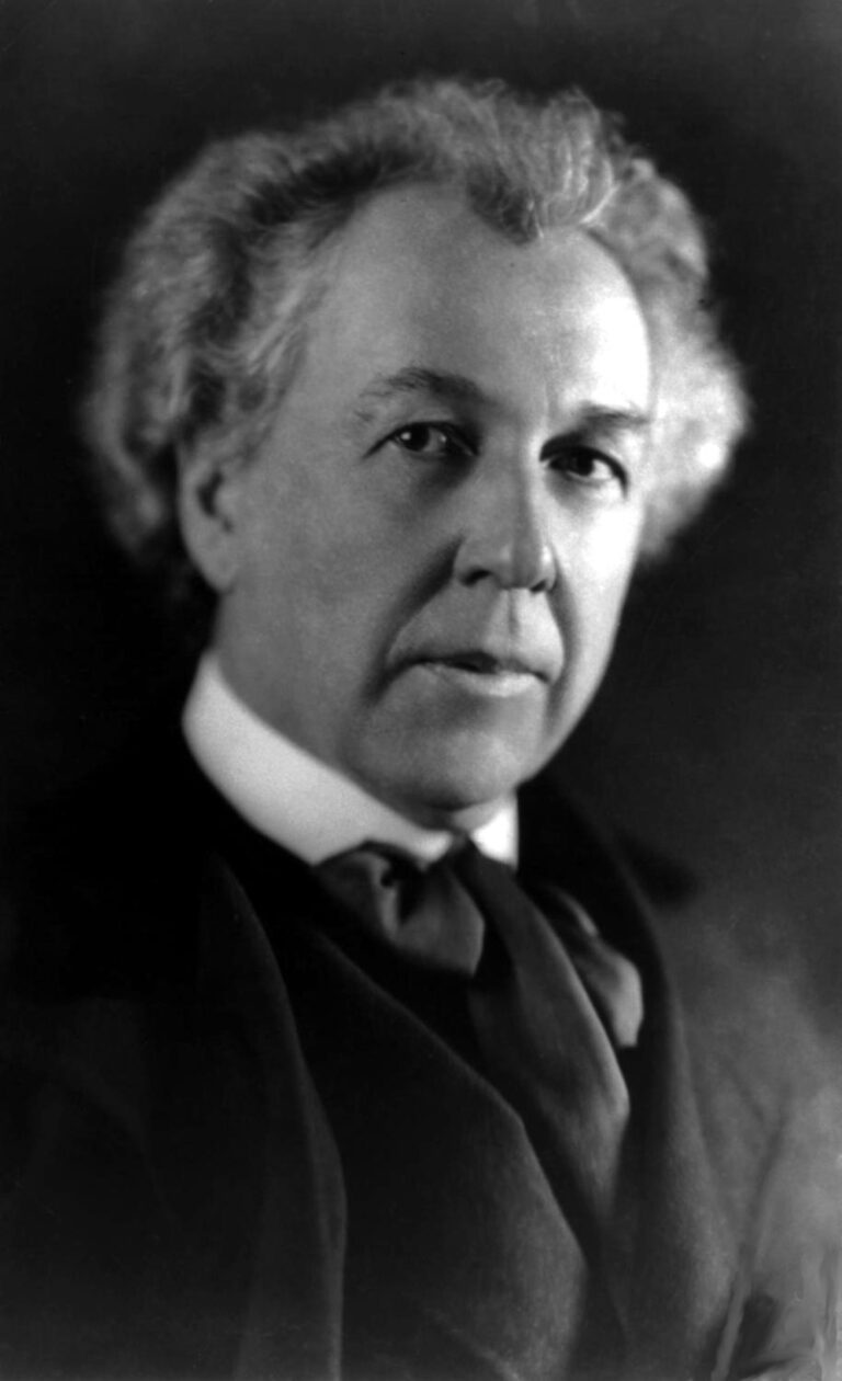 Renowned architect Frank Lloyd Wright portrait in black and white.